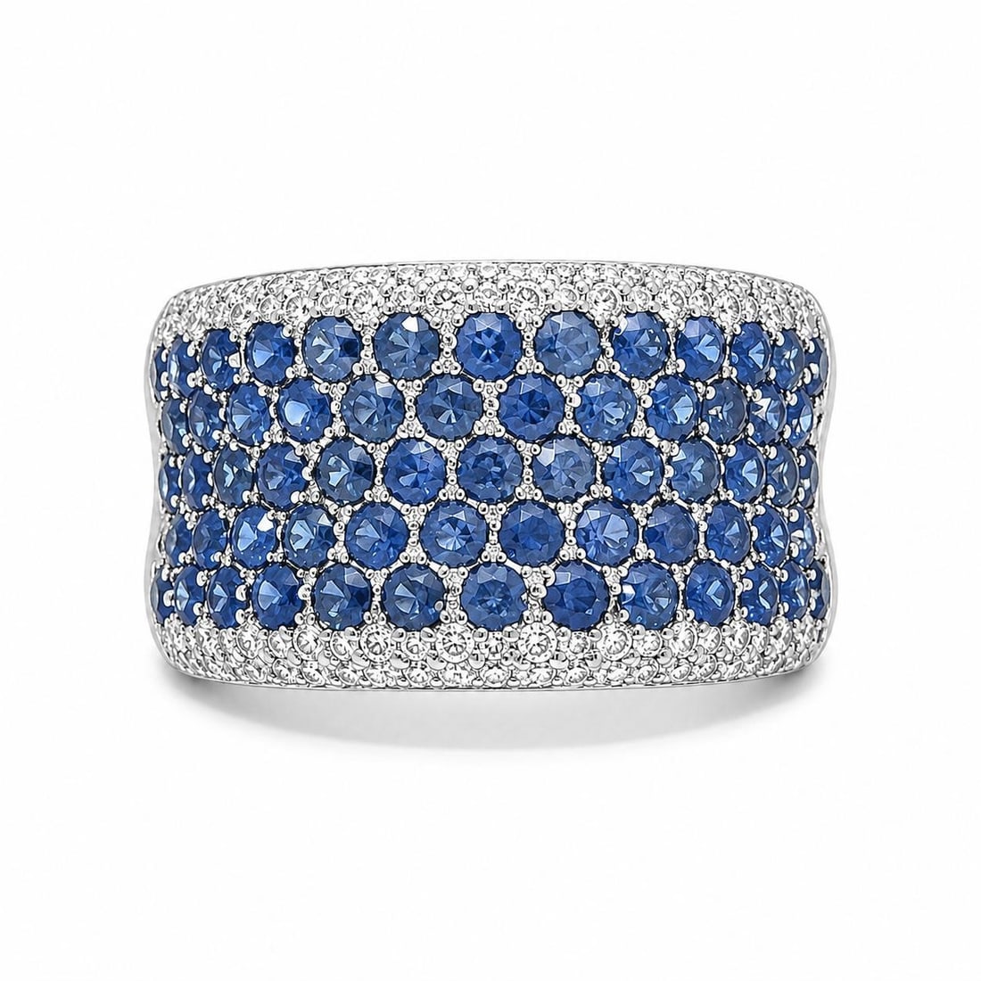 Wide Band Ring in 18k White Gold with Sapphire and Diamond Pave: Wide Band Ring in 18k White Gold with Sapphire and Diamond Pave Wide band ring in solid 18k white gold featuring a pave set design with natural blue sapphires and natural diamonds. The ring is size 9 