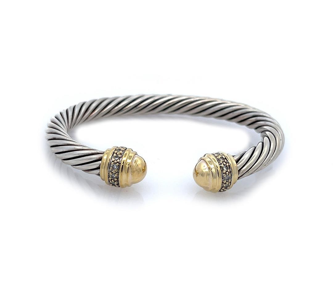 David Yurman Diamond Cuff Bracelet Sterling Silver 18k Gold Flex Cable: David Yurman Diamond Cuff Bracelet Sterling Silver 18k Gold Flex Cable Elevate your accessory collection with this exquisite cuff bracelet by David Yurman. Crafted from a stunning combination of sterl