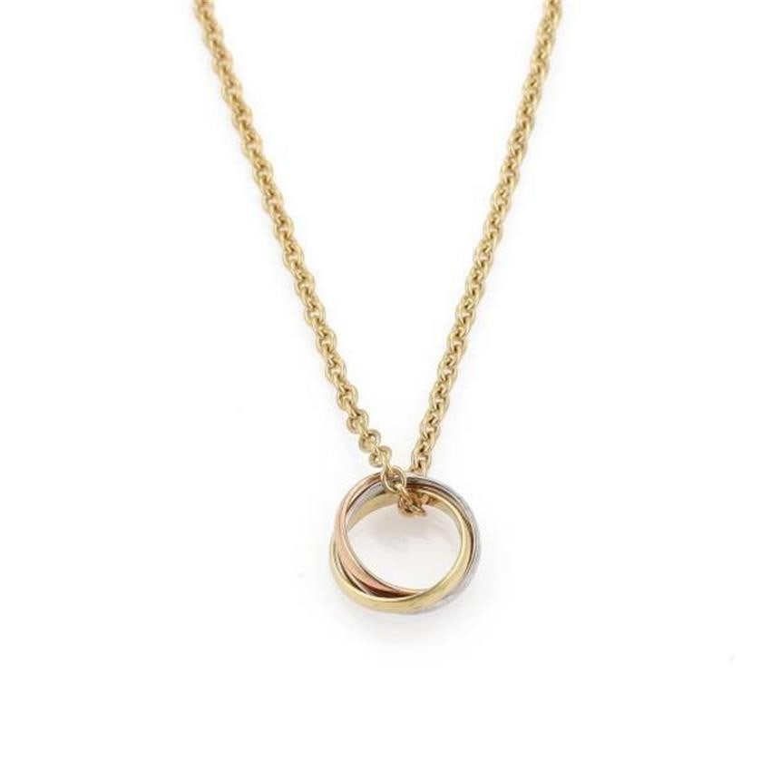 Cartier Trinity Collection 18k Gold Small Triple Ring Necklace with Certificate: Cartier Trinity Collection 18k Gold Small Triple Ring Necklace with Certificate This authentic Cartier necklace from the Trinity collection features a small triple rolling ring pendant crafted from 18