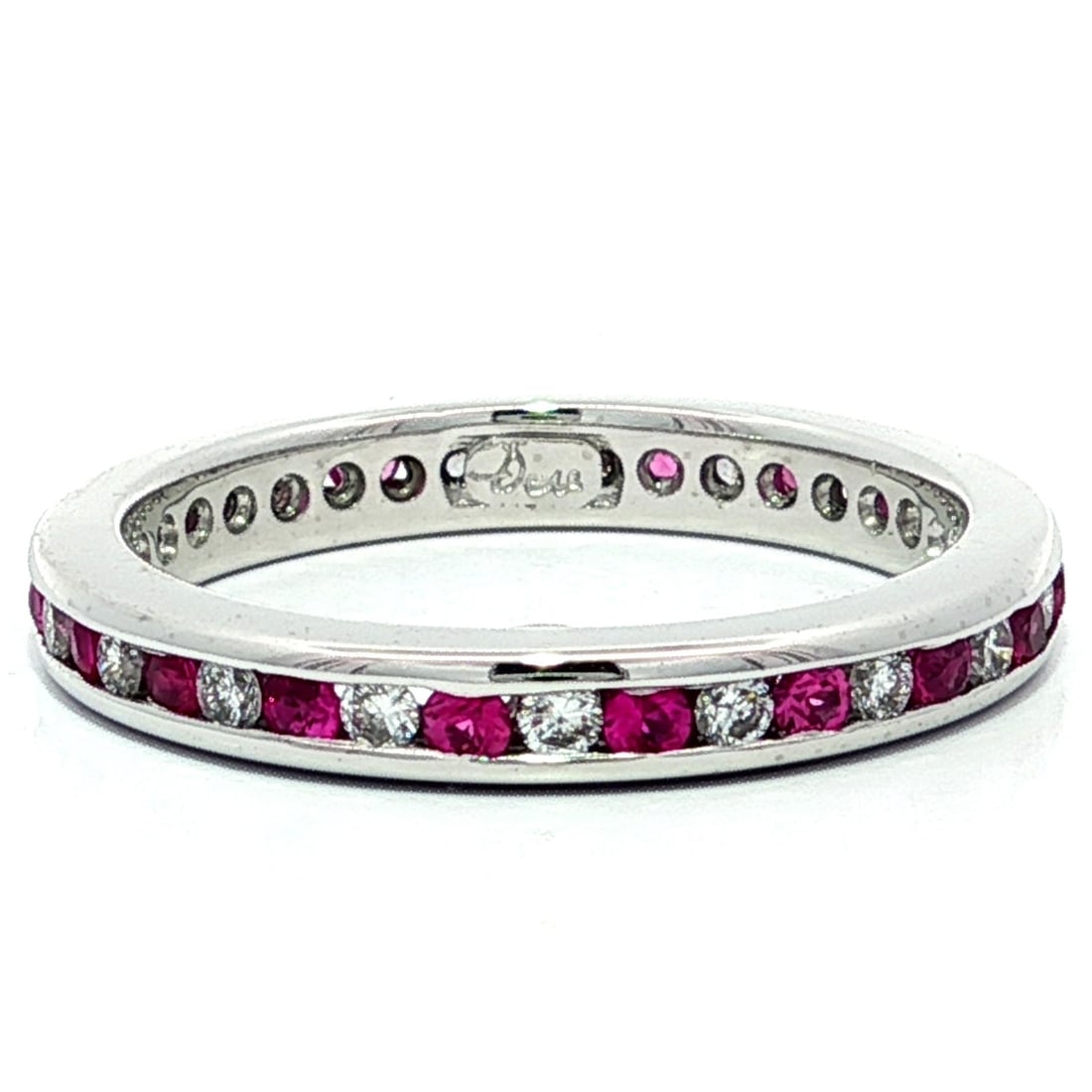 Platinum Eternity Band Ring with 0.68ct Pink Sapphire and Diamond: Platinum Eternity Band Ring with 0.68ct Pink Sapphire and Diamond This exquisite eternity band ring features a stunning design with alternating natural pink sapphires and diamonds. The ring showcases 