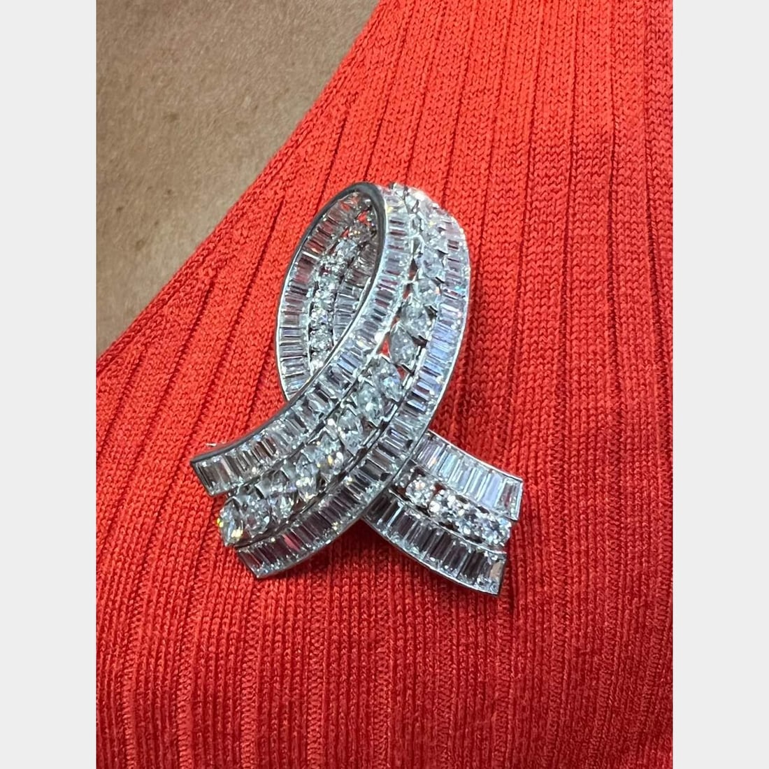 27.50 Ct Art Deco Brooch with Baguette Round Marquise Diamonds: 27.50 Ct Art Deco Brooch with Baguette Round Marquise Diamonds This exquisite Art Deco brooch showcases a stunning array of diamonds, making it a truly standout piece. Weighing 38.2 grams, the brooch 