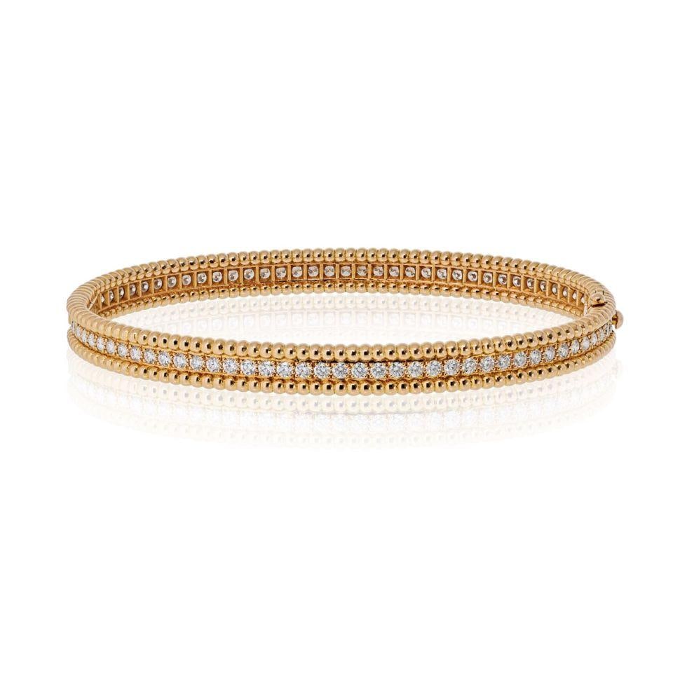 Van Cleef & Arpels 18K Rose Gold Perlee Diamond Bracelet 2.16 Cts: Van Cleef & Arpels 18K Rose Gold Perlee Diamond Bracelet 2.16 Cts This exquisite pre-owned Van Cleef & Arpels Perlee Diamonds bangle bracelet is crafted in luxurious 18K rose gold. It features a singl