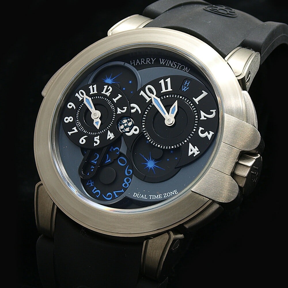 Harry Winston Ocean Dual Time 44mm Zalium Automatic Watch: Harry Winston Ocean Dual Time 44mm Zalium Automatic Watch This Harry Winston Ocean Dual Time men's wristwatch features a 44mm case crafted from Zalium, an advanced alloy known for its lightweight, hyp