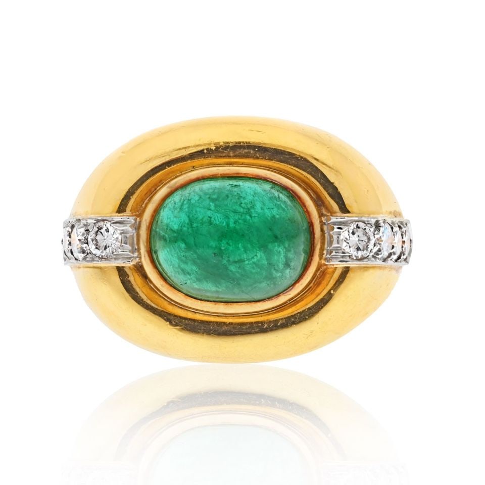 David Webb 18K Yellow Gold Emerald Diamond Ring Estate Piece: David Webb 18K Yellow Gold Emerald Diamond Ring Estate Piece Elevate your style with this exquisite David Webb estate ring crafted in luxurious 18K yellow gold. Featuring a stunning cabochon emerald a