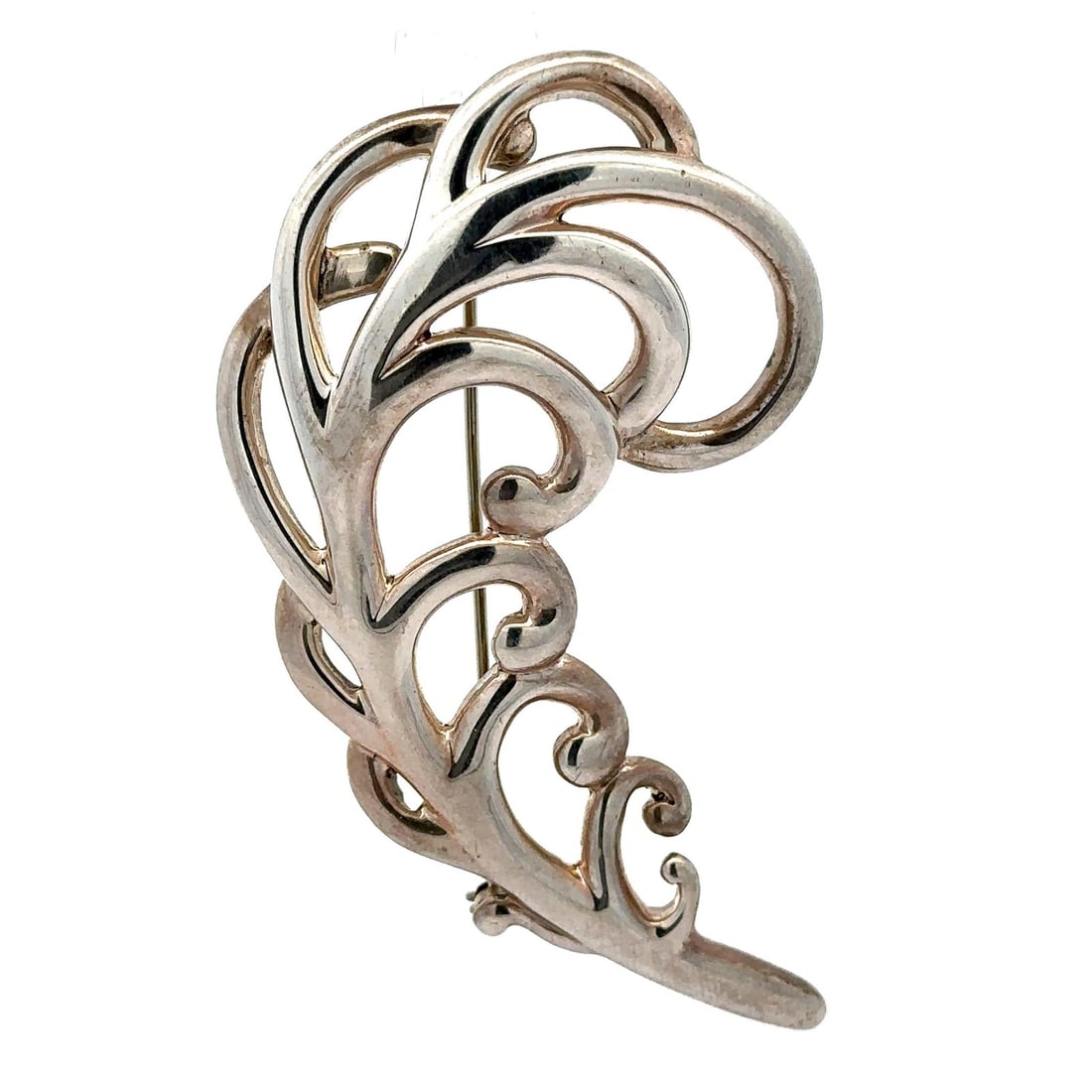 Paloma Picasso Sterling Silver Large Feather Brooch for Tiffany & Co.: Paloma Picasso Sterling Silver Large Feather Brooch for Tiffany & Co. This stunning large feather pin brooch by Paloma Picasso for Tiffany & Co. is a unique piece of jewelry crafted from high-quality 