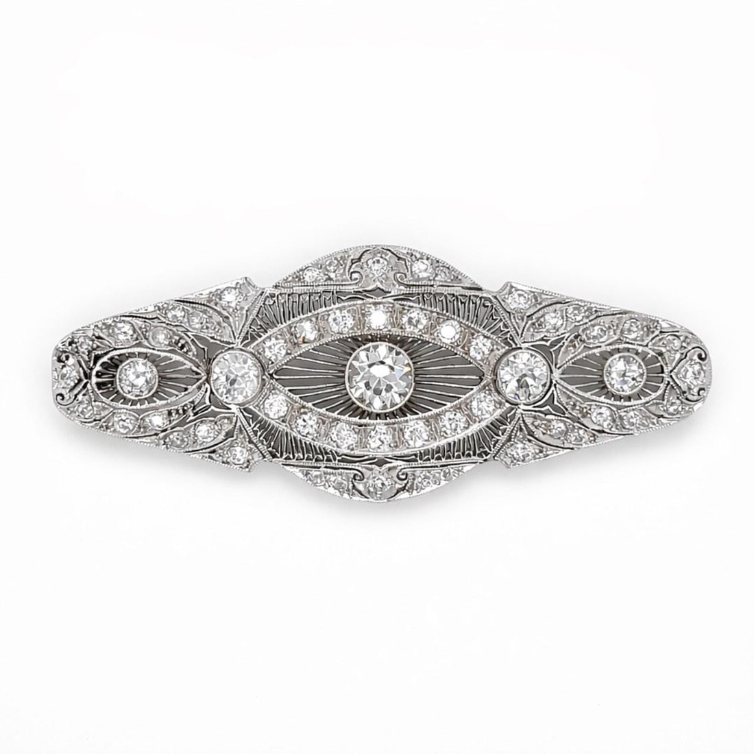 Platinum Art Deco Diamond Brooch Pendant with 4.60 Carats Total: Platinum Art Deco Diamond Brooch Pendant with 4.60 Carats Total This Art Deco platinum pendant and brooch combination features a total diamond weight of approximately 4.60 carats. The centerpiece is s