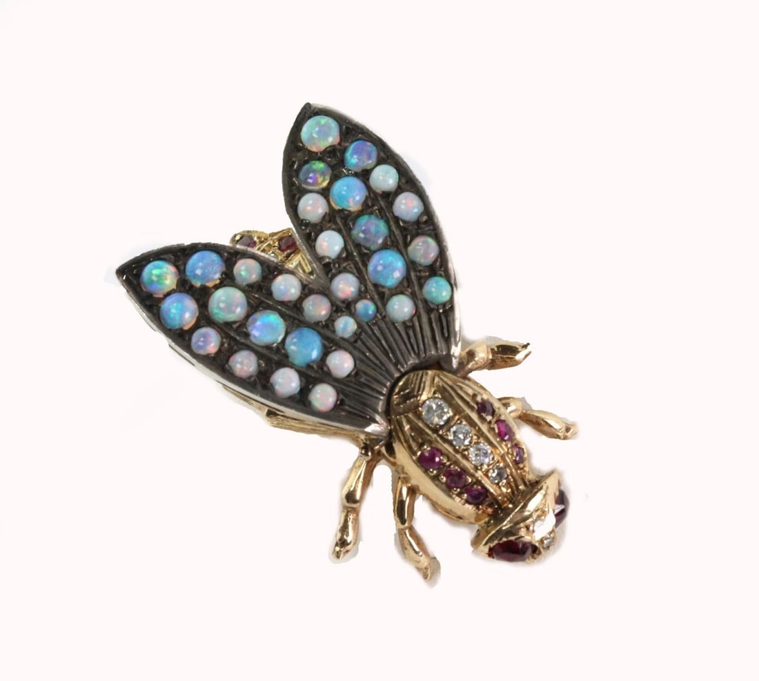 Art Deco 14k Gold Silver Bee Brooch with Opals Garnets Diamonds: Art Deco 14k Gold Silver Bee Brooch with Opals Garnets Diamonds This exquisite Art Deco brooch showcases a stunning design featuring a large bee crafted from 14k yellow gold and silver. The darkened s