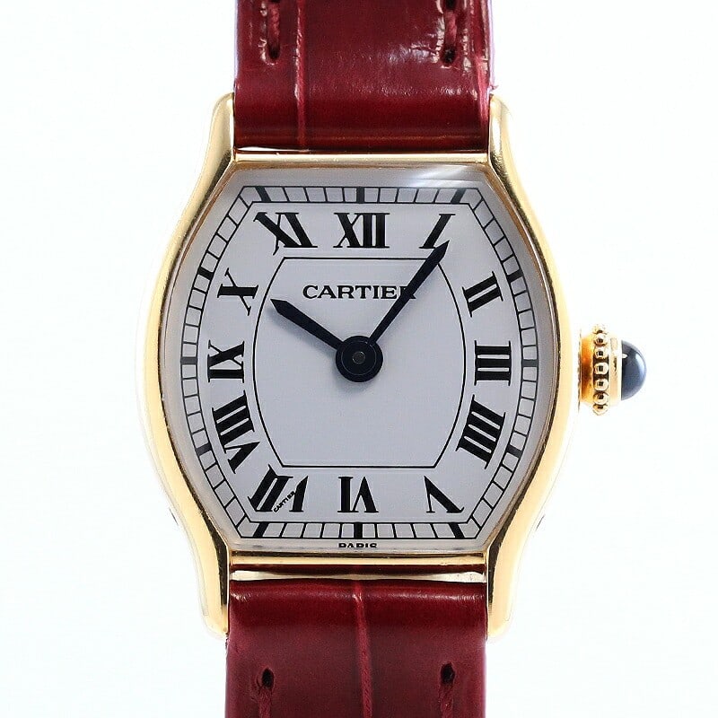 Cartier Tortue 18K Yellow Gold Manual Wind Wristwatch Paris Dial: Cartier Tortue 18K Yellow Gold Manual Wind Wristwatch Paris Dial This Cartier Tortue Small Model wristwatch features an elegant Paris dial and is crafted from 18K yellow gold. Designed for women, it s
