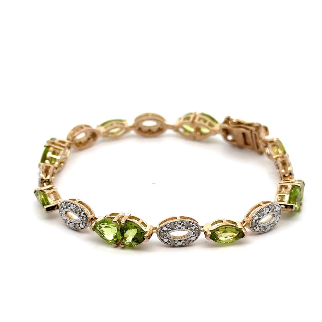 Gold Plated Sterling Silver Heart Bracelet with Peridot and Diamonds: Gold Plated Sterling Silver Heart Bracelet with Peridot and Diamonds This exquisite bracelet features a stunning combination of heart-shaped and marquise-cut natural peridot stones set in a beautiful 