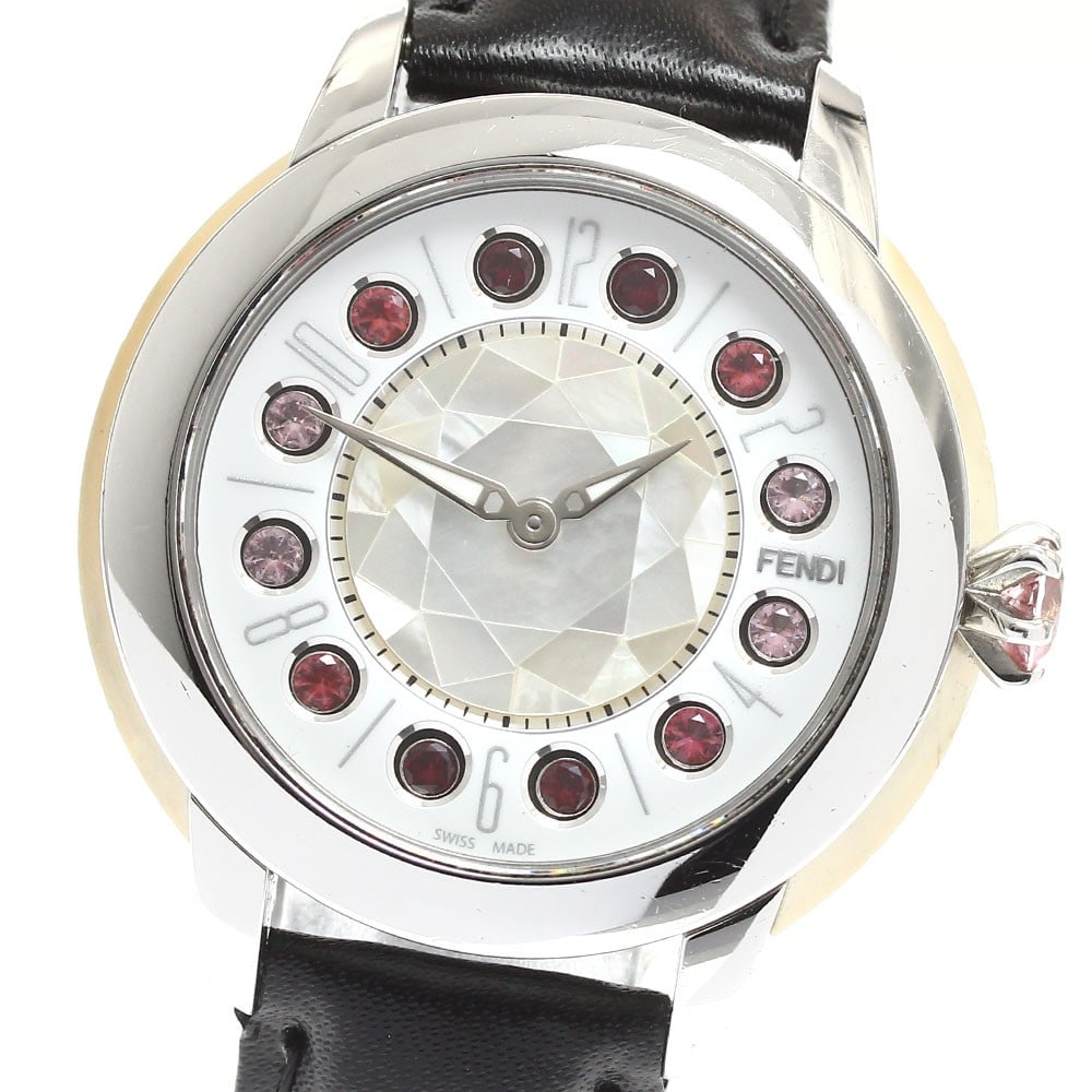 FENDI Eye Shine 12100S Quartz Ladies Wristwatch: FENDI Eye Shine 12100S Quartz Ladies Wristwatch This FENDI Eye Shine 12100S women's wristwatch features a stainless steel case paired with an unused leather strap. The watch showcases a white shell/wh