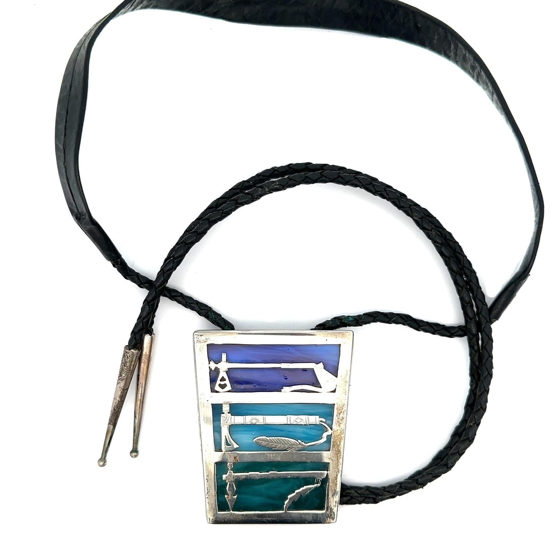 Native American Sterling Silver Tomahawk Bolo Tie with Leather Cord: Native American Sterling Silver Tomahawk Bolo Tie with Leather Cord Showcasing a unique blend of artistry and craftsmanship, this Native American Light Wing Sterling Silver Tomahawk Union of Opposites