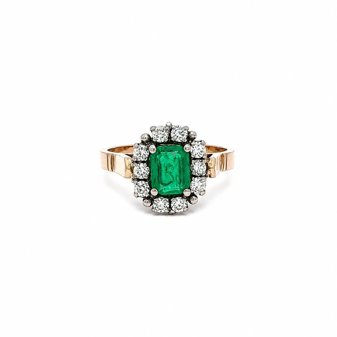 Vintage 14k Yellow Gold Emerald Ring with Diamond Halo 0.90ctw: Vintage 14k Yellow Gold Emerald Ring with Diamond Halo 0.90ctw Vintage cocktail ring featuring a natural vivid green emerald accented by 10 old single cut diamonds in a halo design. Crafted in solid y