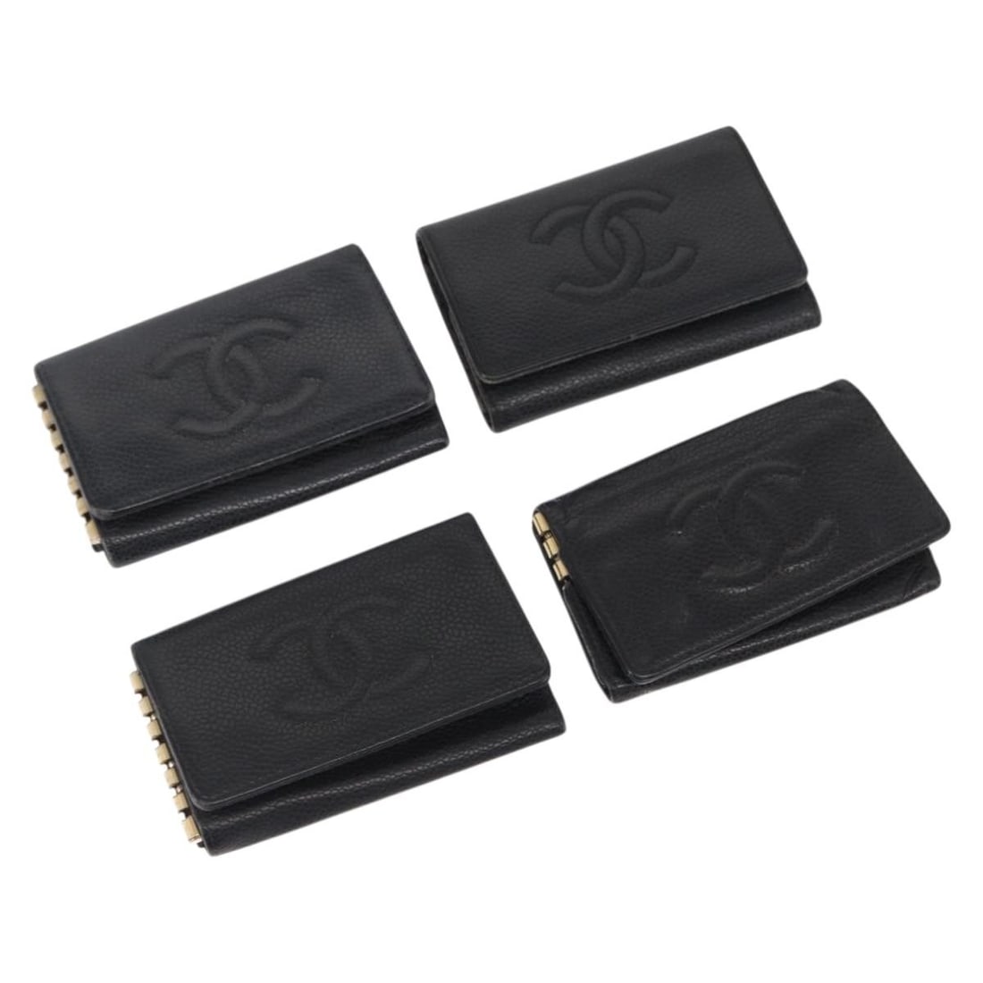 Black Caviar Leather 4 Hook Key Case by CHANEL CC Logo: Black Caviar Leather 4 Hook Key Case by CHANEL CC Logo This CHANEL key case is crafted from black caviar (grained calf) skin and features the signature CC detail. The item is made in France and design