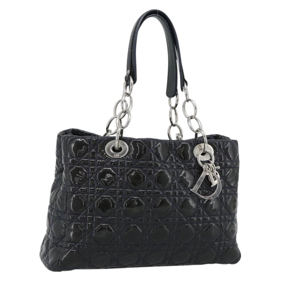 Christian Dior Cannage Patent Hand Bag Navy Silver Tone Italy: Christian Dior Cannage Patent Hand Bag Navy Silver Tone Italy A Christian Dior Canage handbag in navy and silver, crafted in enamel and made in Italy. It features a handle drop of approximately 19 cm 