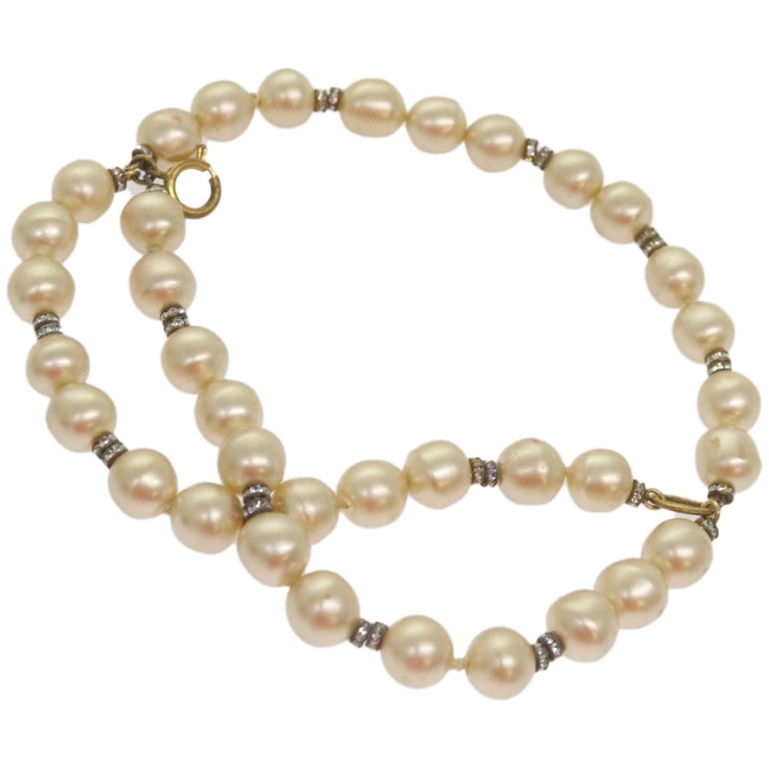 CHANEL white metal pearl CC bracelet with box: CHANEL white metal pearl CC bracelet with box This CHANEL bracelet features a classic white metal design adorned with pearl accents and the iconic CC logo. Made in France, this piece is designed for w