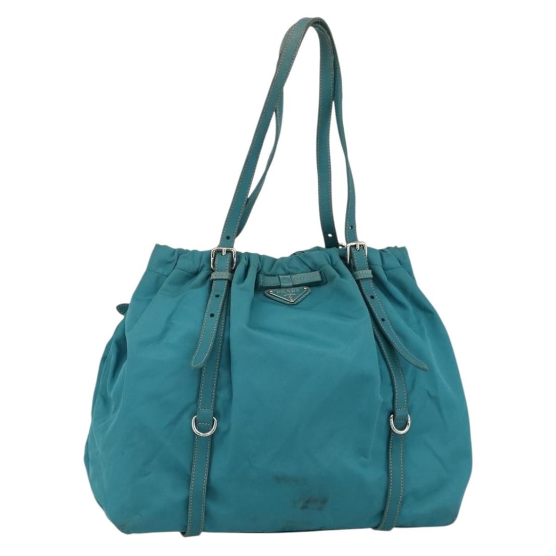 PRADA Nylon Hand Bag Light Blue Silver Made in Italy: PRADA Nylon Hand Bag Light Blue Silver Made in Italy This PRADA hand bag is crafted from nylon in a light blue and silver color combination. It is a women's handbag made in Italy and features a handle