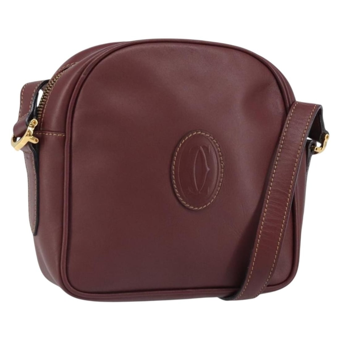 Cartier Must Line Bordeaux Leather Shoulder Bag Gold Accents: Cartier Must Line Bordeaux Leather Shoulder Bag Gold Accents This Cartier Must Line shoulder bag features a bordeaux leather exterior with gold-tone accents. Designed for women, the bag offers a compa
