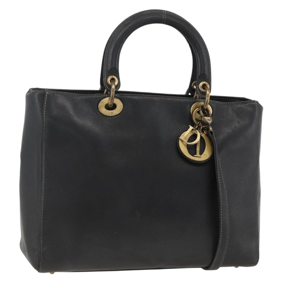 Christian Dior Lady Dior Leather 2way Tote Black Gold: Christian Dior Lady Dior Leather 2way Tote Black Gold A Christian Dior Lady Dior 2-way tote bag in black and gold leather. It comes with a shoulder strap and charm, and was made in Italy. The bag show