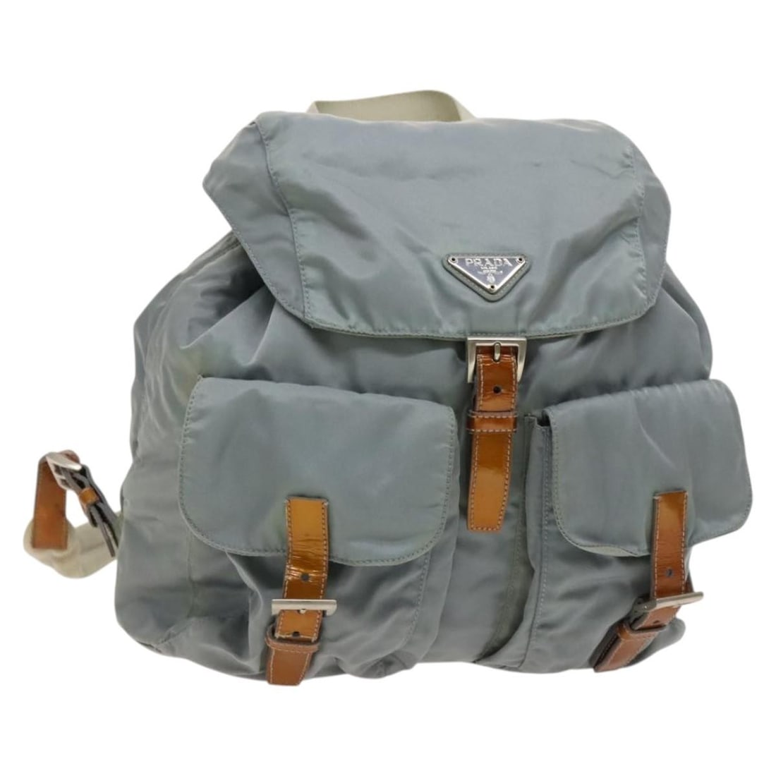 Prada nylon light blue silver women backpack Italy 11.4 x 11.4 x 5.9: Prada nylon light blue silver women backpack Italy 11.4 x 11.4 x 5.9 This PRADA backpack is crafted from light blue nylon with silver accents, offering a stylish and functional accessory. Designed for