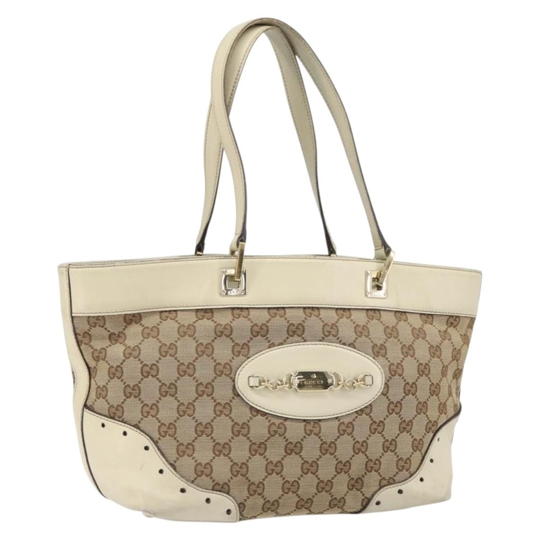 Beige and Gold GG Canvas Tote by Gucci Model 145993: Beige and Gold GG Canvas Tote by Gucci Model 145993 This is a GUCCI GG Canvas tote bag in beige and gold tones, crafted in Italy. The bag features the signature GG canvas exterior with gold-colored le