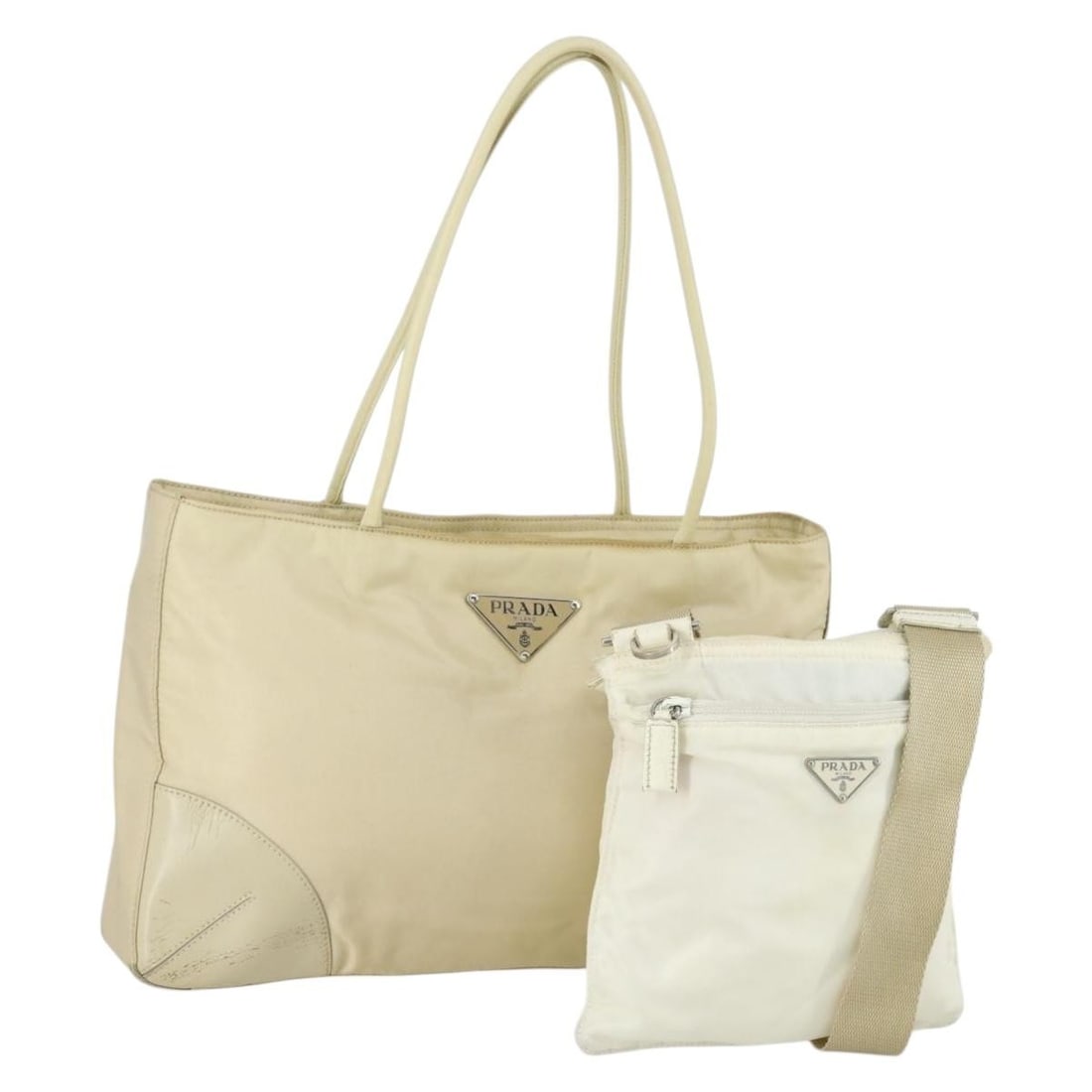 Prada White Beige Nylon Shoulder Bags Set with Guarantee Card: Prada White Beige Nylon Shoulder Bags Set with Guarantee Card This is a PRADA shoulder bag set crafted from nylon in white and beige. Made in Italy, the bags exhibit significant signs of use, includin