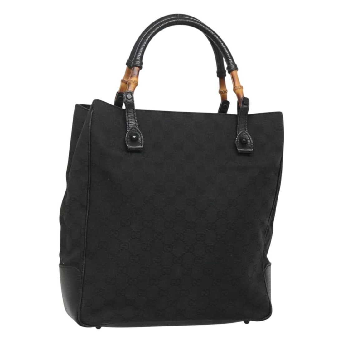 Gucci Black GG Canvas Bamboo Handle Tote Bag Model 112530: Gucci Black GG Canvas Bamboo Handle Tote Bag Model 112530 This is a Gucci GG Canvas Bamboo Tote Bag in black, designed for women. Crafted from signature GG canvas, it features bamboo handles and is ma