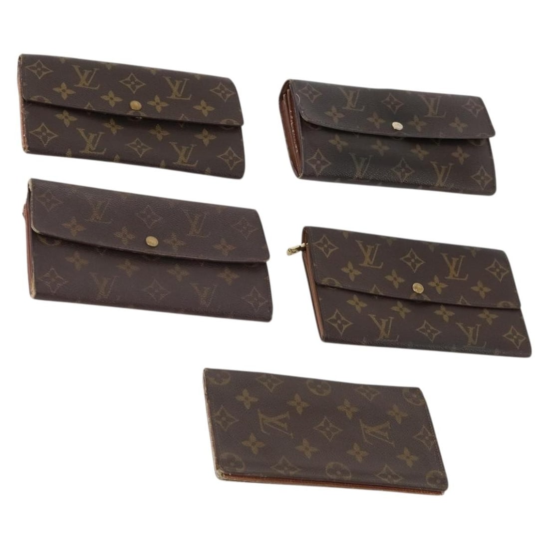Louis Vuitton Monogram Canvas Wallet Bundle 5 Pieces: Louis Vuitton Monogram Canvas Wallet Bundle 5 Pieces This is a set of five Louis Vuitton monogram wallets crafted from monogram canvas and designed for women. The set does not include an item box or d