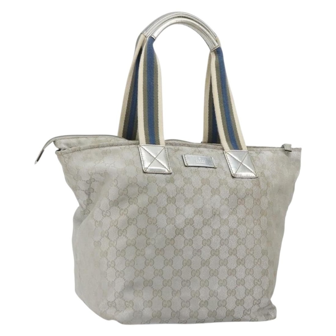 Gucci 131231 GG Canvas Tote in Silver Made in Italy: Gucci 131231 GG Canvas Tote in Silver Made in Italy A Gucci tote bag in silver GG Canvas, made in Italy. This pre-owned bag features a structured tote style with approximate dimensions of W27 cm x H31