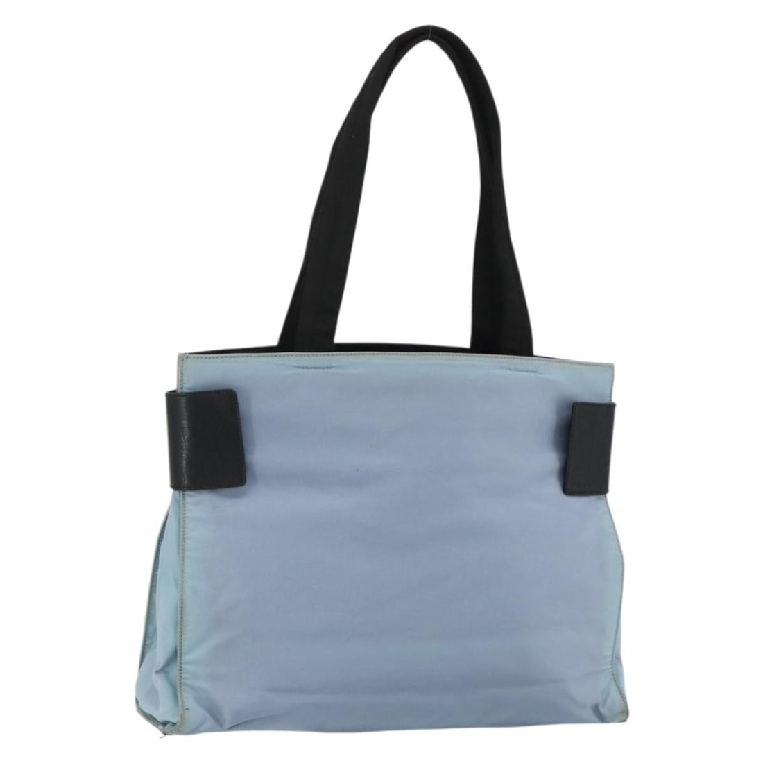 Prada Nylon Light Blue Silver Women Tote Bag Italy: Prada Nylon Light Blue Silver Women Tote Bag Italy This PRADA tote bag is crafted from light blue nylon with silver-tone accents. Designed for women, it features a spacious interior and comfortable ha