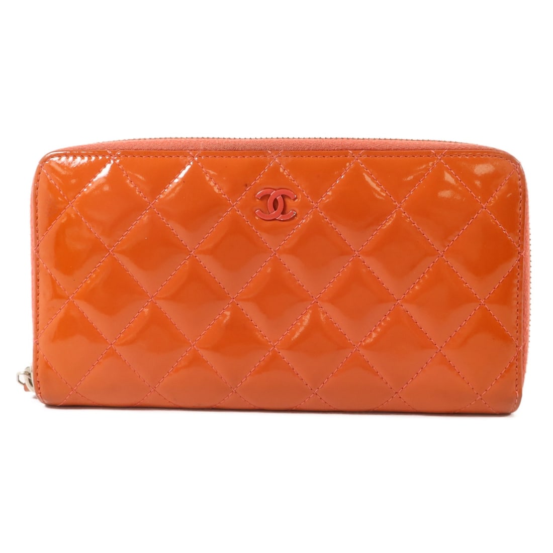 CHANEL CC Patent Leather Zip Around Long Wallet Orange: CHANEL CC Patent Leather Zip Around Long Wallet Orange CHANEL long round wallet in orange patent leather with CC hardware in silver tone. It features a practical interior layout with two wallet compar