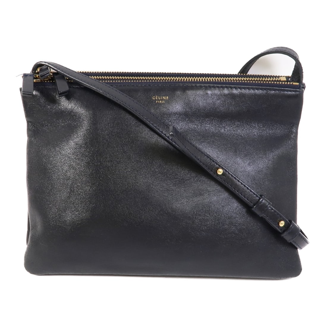 CELINE Trio Shoulder Bag Navy Calfskin Leather GHW: CELINE Trio Shoulder Bag Navy Calfskin Leather GHW CELINE Trio shoulder bag in navy calfskin leather with black accents. This women's regular-size shoulder bag was made in Italy and comes with storage