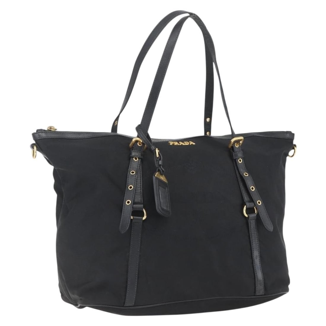 PRADA Black Nylon Tote Bag with Name Tag Gold Tone: PRADA Black Nylon Tote Bag with Name Tag Gold Tone Black Prada nylon tote bag with gold-tone hardware, made in Italy. It includes a name tag accessory and has a tote bag style. The bag is heavily used