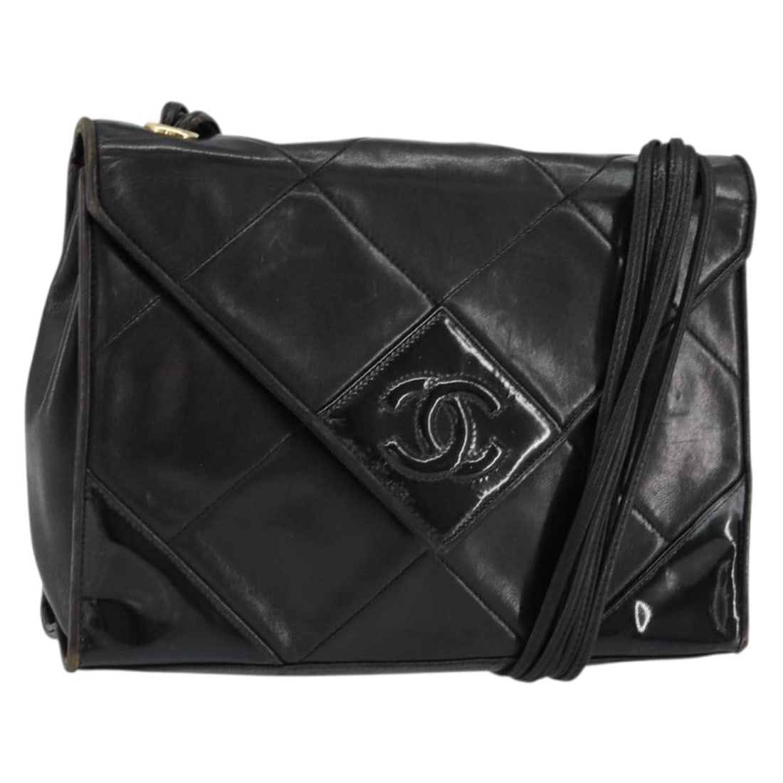 Black Lamb Skin Shoulder Bag CHANEL Matelasse CC with Guarantee Card: Black Lamb Skin Shoulder Bag CHANEL Matelasse CC with Guarantee Card A CHANEL Matelasse shoulder bag in black lamb skin with gold-tone CC hardware. This piece includes a guarantee card and was made in