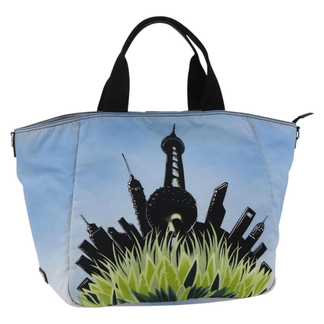 Prada Blue Nylon Tote Bag with Silver Tone Hardware: Prada Blue Nylon Tote Bag with Silver Tone Hardware Prada tote bag in blue and silver nylon, made in Romania. This bag measures approximately W34 cm x H29 cm x D15 cm, with a handle drop of approximat