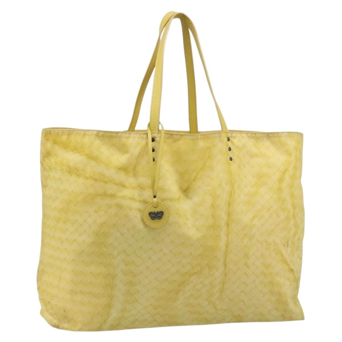 Bottega Veneta Intrecciato Yellow Nylon Tote Bag with Charm: Bottega Veneta Intrecciato Yellow Nylon Tote Bag with Charm Bottega Veneta Intrecciato tote bag in yellow nylon, made in Italy. This bag comes with a charm and has a heavily used condition with visibl