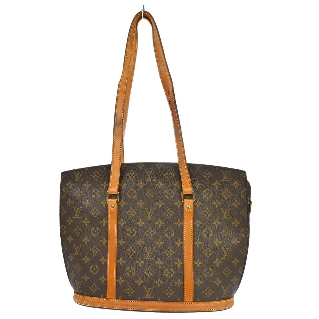Louis Vuitton Babylone Monogram Canvas Tote Bag M51102: Louis Vuitton Babylone Monogram Canvas Tote Bag M51102 Vintage Louis Vuitton Babylone tote bag in brown monogram canvas with leather trim and double handles. This large zip-top handbag features a brow