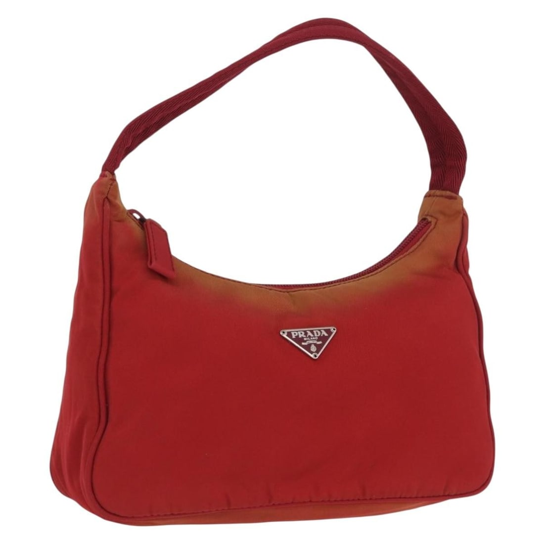 Prada red nylon women s hand bag Italy silver trim: Prada red nylon women s hand bag Italy silver trim This PRADA handbag is crafted from red and silver nylon and features a compact, structured silhouette. The bag is designed for women and was made in 
