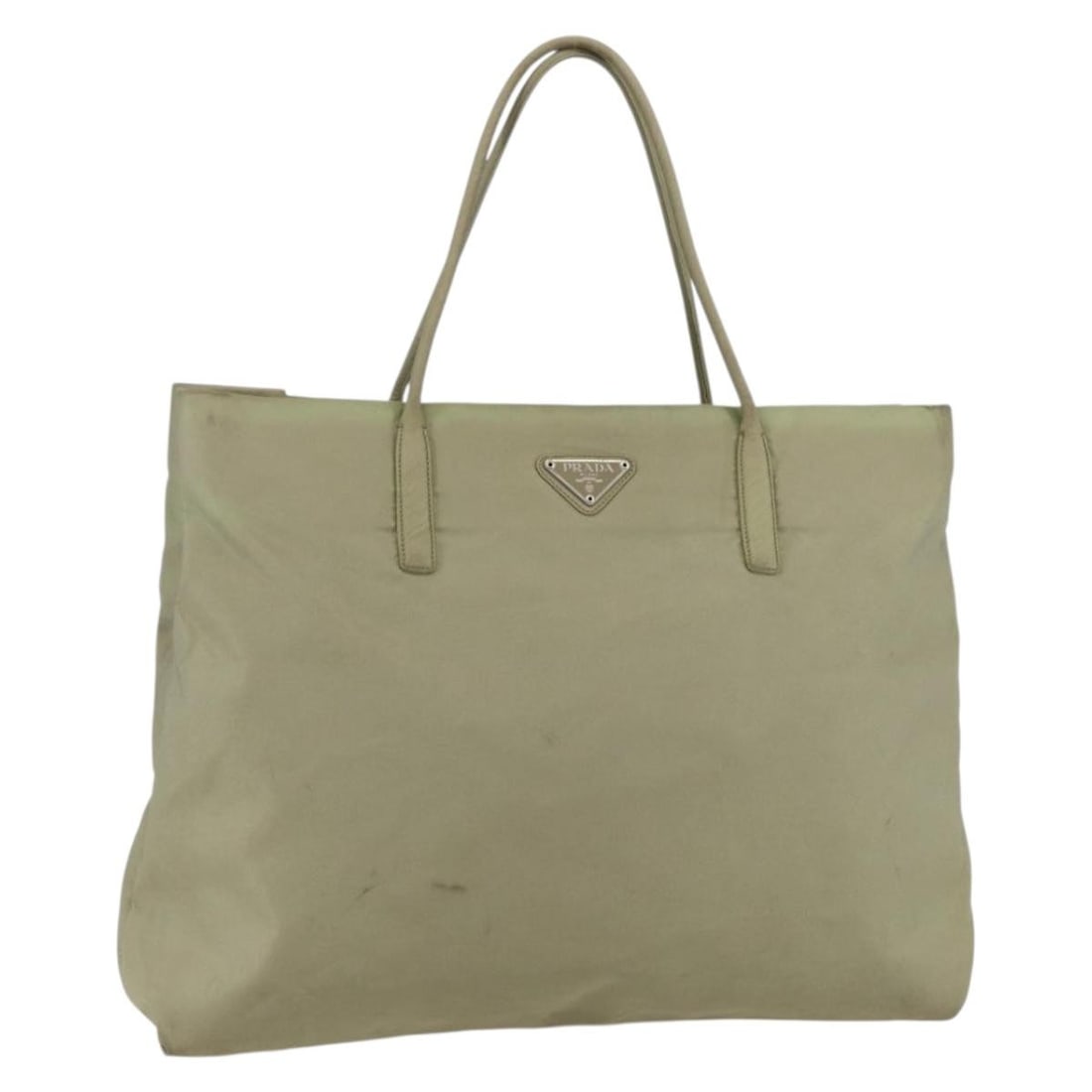 Prada beige silver nylon tote bag Italy 14.2 inch: Prada beige silver nylon tote bag Italy 14.2 inch This PRADA tote bag is crafted from beige and silver nylon, offering a lightweight and practical design. Made in Italy, the bag features dual handles 
