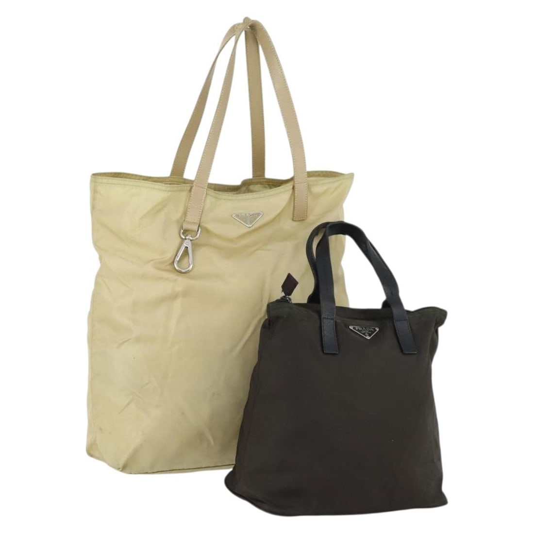 PRADA Nylon Khaki Beige Tote Bag Pair with Guarantee Card: PRADA Nylon Khaki Beige Tote Bag Pair with Guarantee Card This PRADA tote bag set features two nylon bags in khaki and beige tones, designed for women. Made in Italy, these tote bags showcase the bran