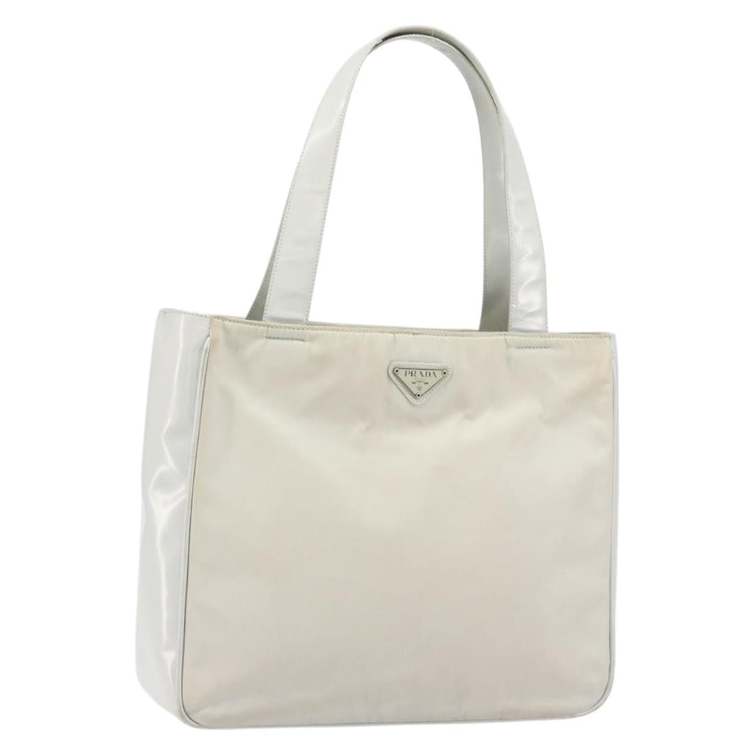 Prada Gray Nylon Leather Tote Bag for Women Made in Italy: Prada Gray Nylon Leather Tote Bag for Women Made in Italy This PRADA tote bag is crafted from gray and silver nylon with leather accents. Designed for women, it offers a spacious interior and features