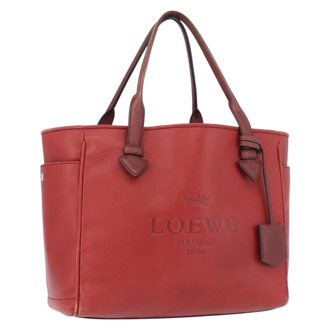 LOEWE red silver leather women tote bag Spain: LOEWE red silver leather women tote bag Spain This LOEWE Heritage tote bag is crafted from red and silver leather and features a spacious design with dual top handles. The bag is made in Spain and inc