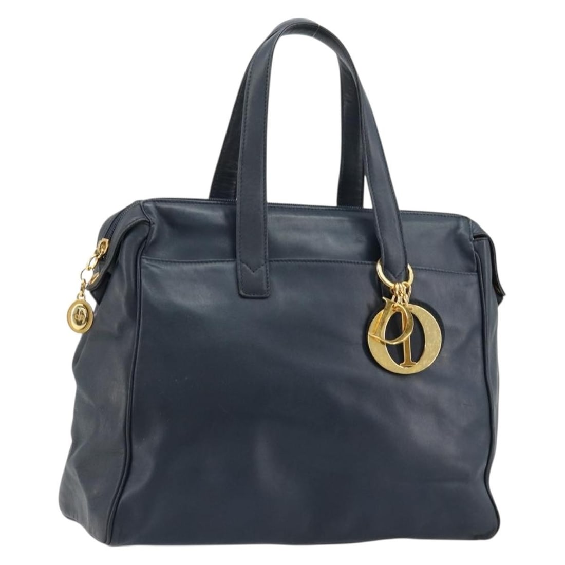 Christian Dior Navy Leather Hand Bag with Charm Italy: Christian Dior Navy Leather Hand Bag with Charm Italy Christian Dior women's hand bag crafted in leather with a navy and gold color scheme. Made in Italy, it comes with a charm accessory and measures 