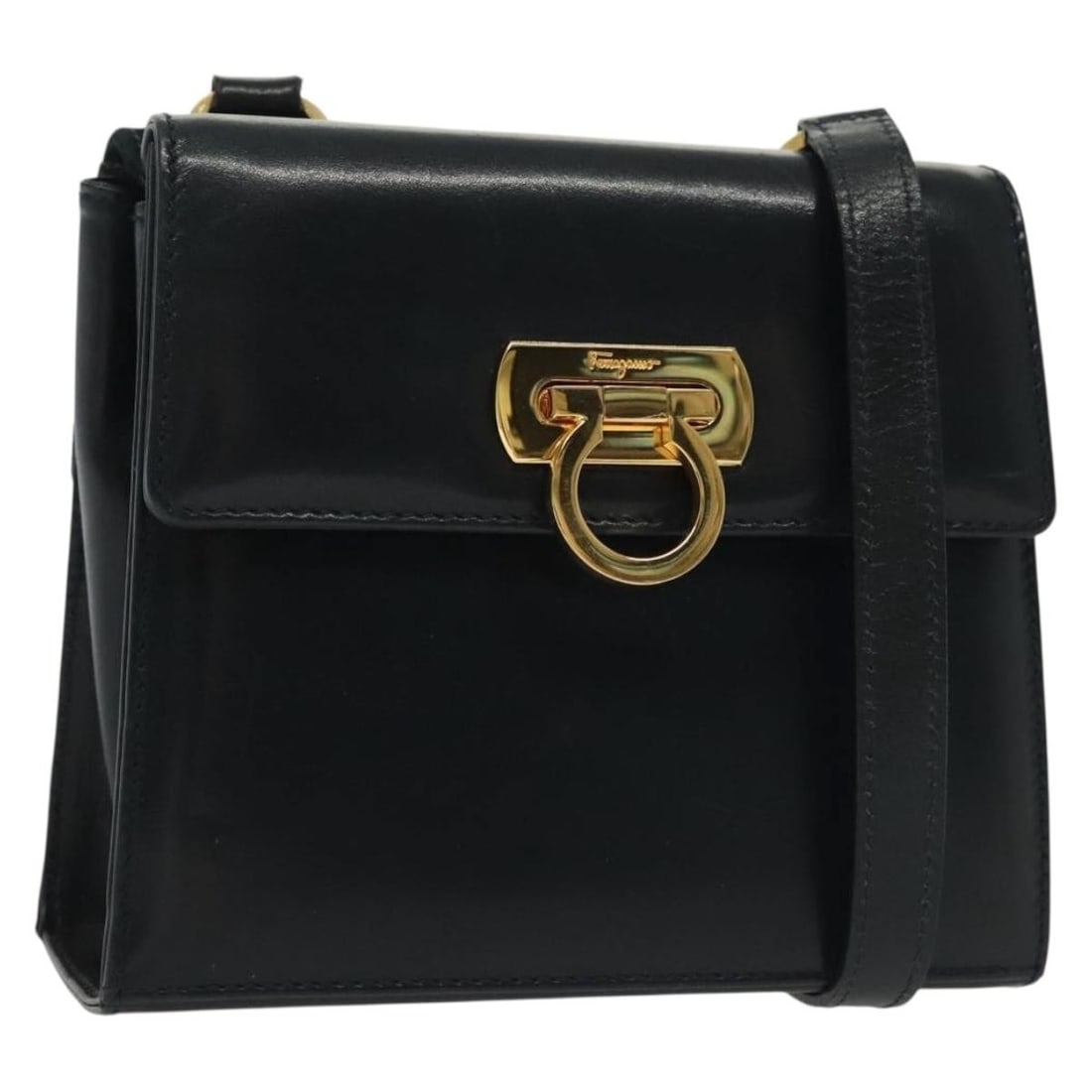 Ferragamo Gancini Navy Gold Leather Suede Shoulder Bag Italy: Ferragamo Gancini Navy Gold Leather Suede Shoulder Bag Italy This Salvatore Ferragamo Gancini shoulder bag features a sophisticated combination of navy leather and suede with gold-tone accents. Made i