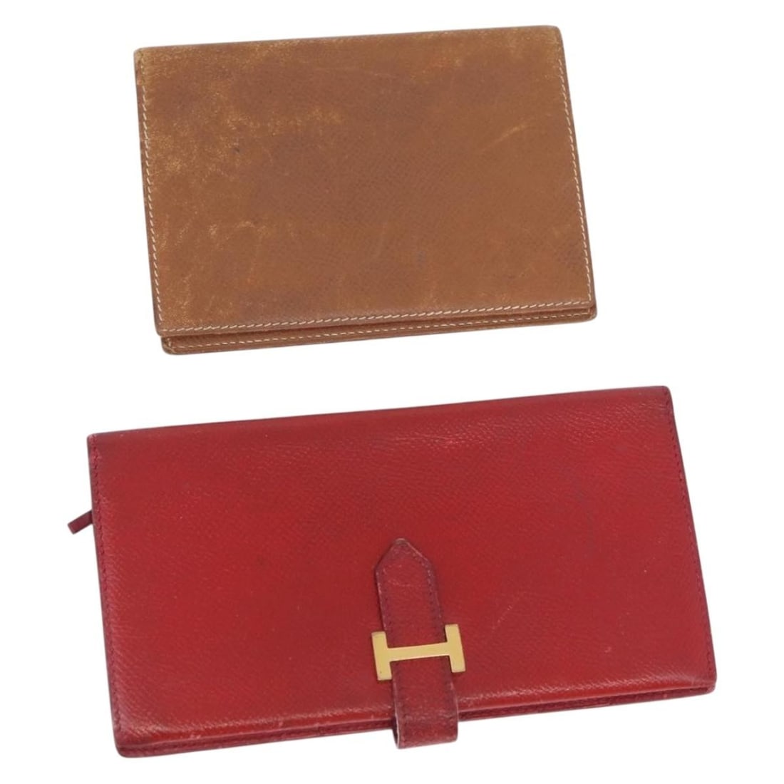 Hermes brown red leather wallet set of 2: Hermes brown red leather wallet set of 2 This set includes two Hermes wallets crafted from leather in brown and red. Designed for women, both wallets are made in France and feature an exterior and int