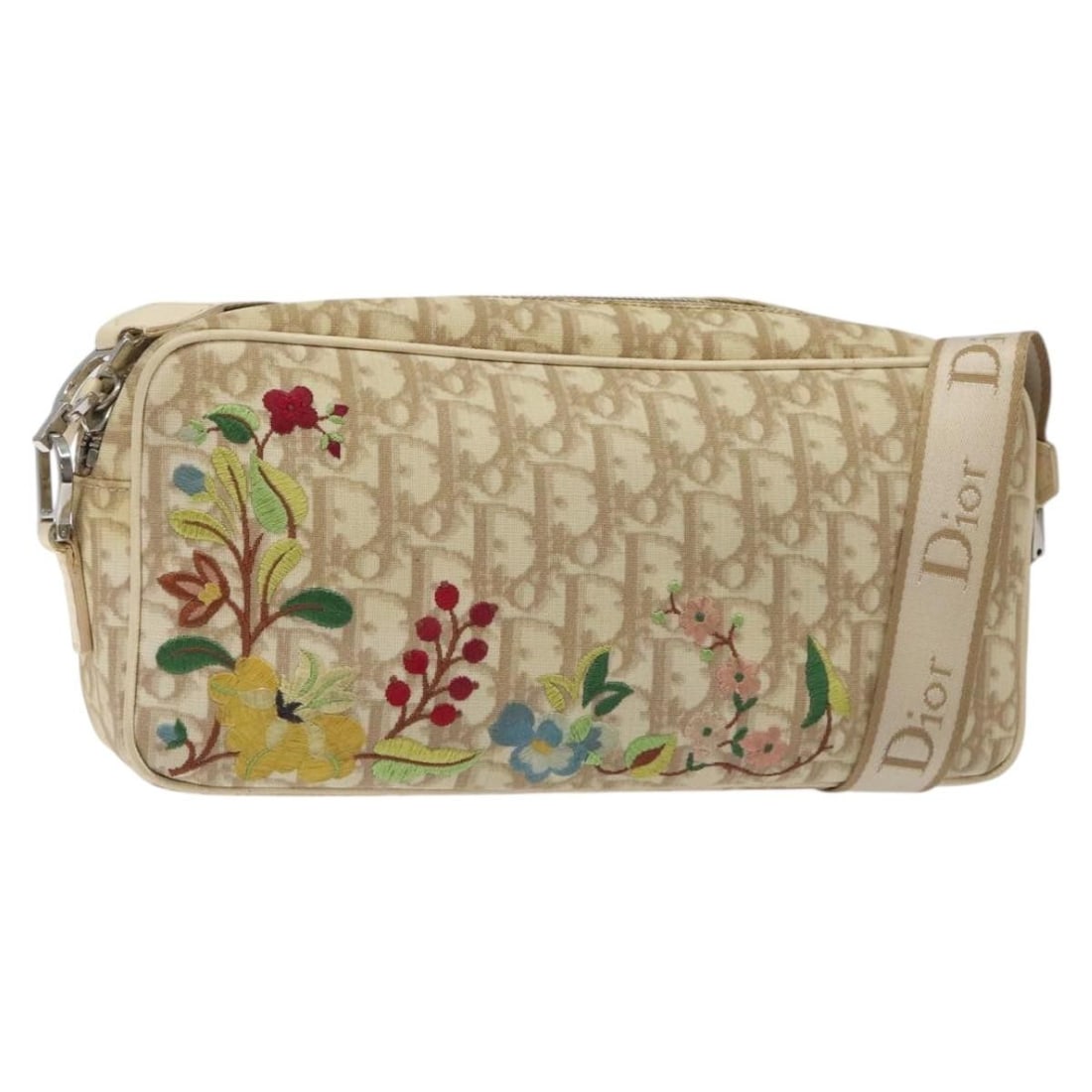 Christian Dior Flower Shoulder Bag in Beige Trotter Canvas Silver Tone: Christian Dior Flower Shoulder Bag in Beige Trotter Canvas Silver Tone Christian Dior shoulder bag in beige and silver Trotter canvas, made in Italy. It comes with a guarantee card and features a shou
