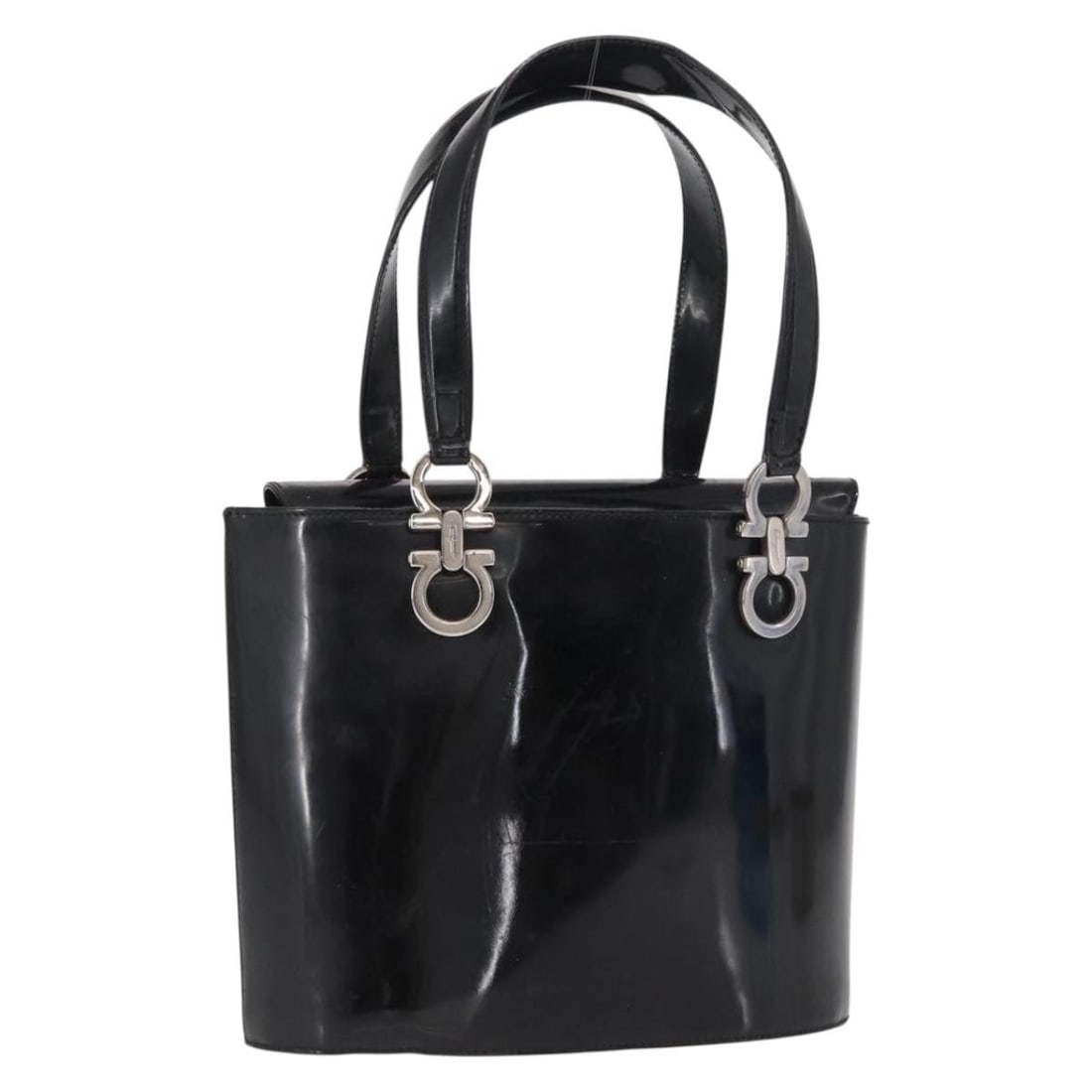 Salvatore Ferragamo Black Patent Leather Handbag with Silver Accents: Salvatore Ferragamo Black Patent Leather Handbag with Silver Accents This Salvatore Ferragamo handbag is crafted from black patent leather with silver-tone accents. Designed for women, it features a s