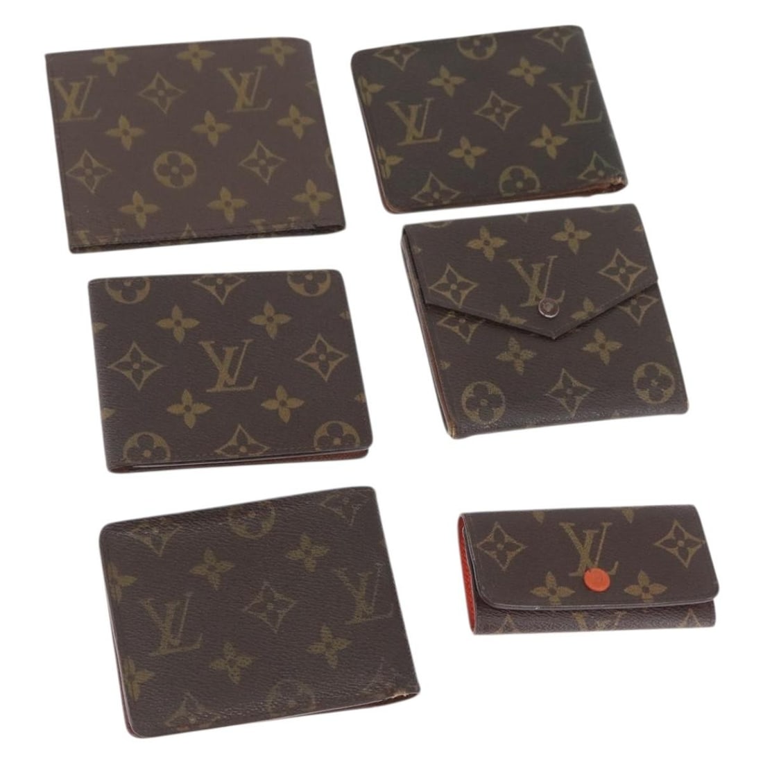 Set of 6 Monogram Canvas Wallets by Louis Vuitton for Women: Set of 6 Monogram Canvas Wallets by Louis Vuitton for Women This is a Louis Vuitton Monogram Canvas wallet set designed for women. The set is made in France and features the classic Louis Vuitton mono