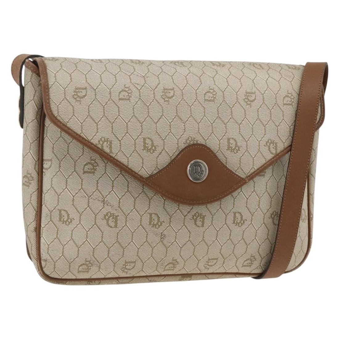 Christian Dior Beige Honeycomb PVC Canvas Shoulder Bag Gold Tone Hardware: Christian Dior Beige Honeycomb PVC Canvas Shoulder Bag Gold Tone Hardware This Christian Dior shoulder bag features a honeycomb canvas design with beige and gold accents. Made from PVC leather, the ba