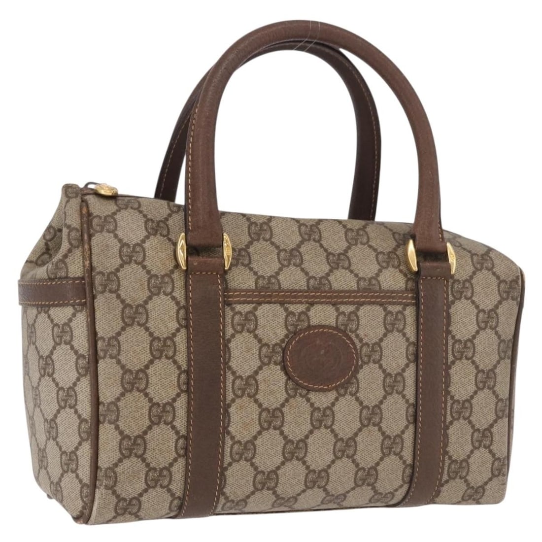 Gucci GG Supreme PVC Handbag Beige Gold Tone 000 58 0093: Gucci GG Supreme PVC Handbag Beige Gold Tone 000 58 0093 Gucci GG Supreme hand bag in beige and gold, made from PVC leather and GG canvas. It measures approximately W25 x H15 x D10 cm with a handle dr