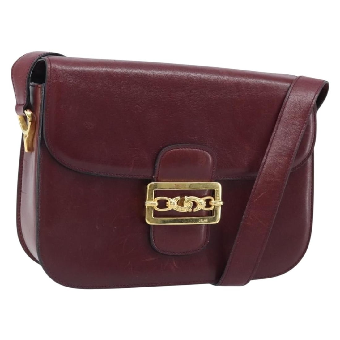Celine Bordeaux Leather Shoulder Bag Gold Tone Hardware Italy: Celine Bordeaux Leather Shoulder Bag Gold Tone Hardware Italy A CELINE shoulder bag in bordeaux leather with gold-tone hardware. Made in Italy, this bag measures approximately W25 x H18 x D4 cm, with 